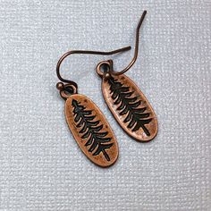 Minimalist Copper Pine Tree Earrings Small Dangle Earrings - Etsy Handmade Rustic Jewelry For Outdoor, Rustic Everyday Earrings, Rustic Drop Earrings Jewelry For Gift, Rustic Drop Earrings As A Gift, Rustic Drop Earrings Jewelry Gift, Nature-inspired Bronze Earrings For Gifts, Hand-forged Copper Nature-inspired Jewelry, Nature-inspired Copper Earrings As Gift, Pine Tree Jewelry