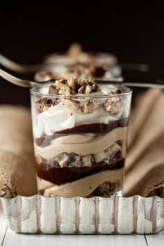 a glass with some food in it on top of a table