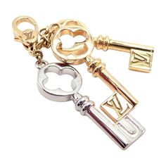 About This Piece: This rare Louis Vuitton charm pendant features three keys, each crafted from 18k gold in three distinct colors: yellow, white, and rose. The rose gold key is elegantly adorned with red enamel to form a heart shape, showcasing LV's exqmbolic pieuisite attention to detail. A luxurious and syce, it embodies love and sophistication. Metal: 18k Yellow, Rose, and White Gold  Size: 38mm Total Each key is 8mm wide  Weight: 5.4 grams  Hallmarks: LV 750   Please refer to the dimensions in the description above for accurate measurements. Please reach out to the seller with any questions on dimensions or fit prior to purchase. Luxury Yellow Gold Pendant Charms, Luxury Gold Jewelry With Keys, Luxury White Gold Charms For Gift, Luxury Engraved Yellow Gold Charms, Rare Louis Vuitton, Lapis Necklace, Gold Key, Vintage Beads Necklace, Heart Necklace Diamond