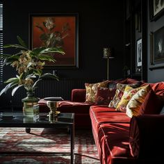 a living room filled with furniture and a large potted plant on top of a coffee table