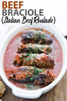 beef braciole in a white bowl with bread on the side and text overlay