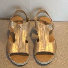 Sesto Meucci Made In Italy Gold Leather Open Toe Strappy Sandals Size 10 New Condition Is New Without Box Beautiful Soft Plantino Suede Metallic Gold Leather Front Zipper Sling Backback Sandals, Never Worn Gold Leather T-strap Heels, Gold T-strap Leather Heels, Spring Gold Leather Wedge Sandals, Tan T-strap Sandals For Spring, Casual Gold Leather Wedge Sandals, Tan Synthetic Open Toe Sandals, Cork Sandals, Brown Leather Heels, Leather Heels Sandals