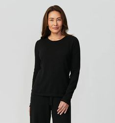 Sferra Intimita Cashmere Black Long Sleeve Top proves that relishing in the comfort of home is best enjoyed in the comfort of pure cashmere, with velvety soft loungewear long sleeve top that turn days of rest and relaxation into truly sublime rituals. Fabrication Yarn-dyed single ply knit Fiber 100% Cashmere Finishing Neck: 3/8-inch rib binding Sleeve and Bottom Sweep Hem: 7/8-inch turn back Hem Plain hem Origin China Long Sleeve Cashmere Sweater For Loungewear, Elegant Long Sleeve Tops For Lounging, Solid Cashmere Sweater For Loungewear, Cozy Cashmere Tops For Loungewear, Cashmere Tops With Ribbed Cuffs For Loungewear, Monogram Bedding, Grandmillenial Style, Childrens Rugs, Black Long Sleeve Top