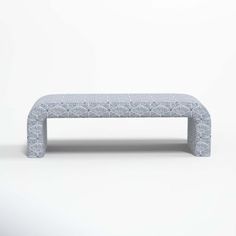 an upholstered bench is shown in front of a white background with the word,