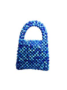 Artisan Beaded Handbag.Designed in NYC. Crafted with precision in the heart of Lagos, Nigeria.Elevate your style with our exquisite beaded handbags – a timeless accessory that seamlessly blends sophistication with versatility. Meticulously handcrafted, these bags are built to withstand the test of time. Whether paired with a cocktail dress, jeans and a tee, professional attire, or your favorite clubwear, our bead bags effortlessly complement any ensemble.