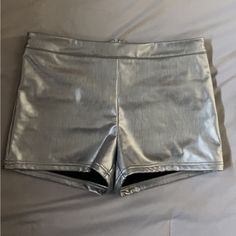 Brand New Silver Pleather Shorts, Never Worn No Stains Or Rips. Faux Leather Short Bottoms For Party, Short Faux Leather Party Bottoms, Casual Metallic Finish Shorts For Night Out, Casual Metallic Shorts For Night Out, Chic Metallic Short Bottoms, Fitted Faux Leather Shorts For Summer, Fitted Faux Leather Summer Bottoms, Faux Leather Bottoms With Built-in Shorts For Night Out, Trendy Faux Leather Bottoms For Summer