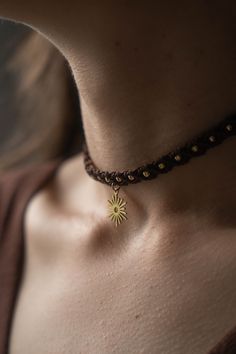 * Waxed macrame cord * Stainless steel sun pendant * Adjustable sliding knot ☀️ Minimalist Gold Macrame Sun Choker ☀️ Add a touch of delicacy and elegance to your style with our gold macrame sun choker adorned with a charming minimalist sun pendant. ☀️ Versatile Style: Wear it alone for a streamlined look, or layer it with other necklaces, this simple necklace a...#of #of #Tidiness #Allure #A #the #Jewelry #The #Fashion #Choker #Timeless #StatementJewelry #the #Necklaces #Exploring #Statement Macrame Sun, Sun Choker, Choker Simple, Macrame Choker, Minimalist Necklace Gold, Natural Accessories, Boho Choker, Chic Necklace, Bohemian Accessories