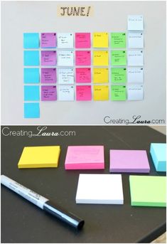 a desk with sticky notes and a pen on it