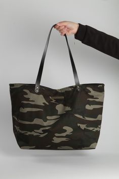 Details:  - Camouflage Tote Bag - Measurements: 32cm high x 49cm wide x 14cm deep - Black inside - Inner pocket - Black leather handles - Handmade in Barcelona   #totebag #camobag #bag #camuflaje #bolsos #handmade #fashion #lagut Coated Canvas Tote Bag With Reinforced Handles, Coated Canvas Tote Shoulder Bag With Reinforced Handles, Military Style Satchel Bag For Everyday Use, Military Style Rectangular Bag For Everyday Use, Military Style Satchel For Everyday Use, Military Style Shoulder Bag For Travel, Military Style Satchel Bag For Daily Use, Military Style Shoulder Bag For Everyday Use, Military Style Shoulder Bag For Daily Use