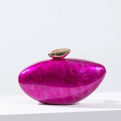 Make a stunning statement this season with our Glamour Boho Pearl Clutch Bag! This exquisite accessory, crafted from high-quality acrylic, features a unique egg shape that embodies both elegance and modern design. The bright fuchsia hue, complemented by a lustrous pearl effect, adds a touch of luxurious and romantic flair perfect to bring a sophisticated finish to your Boho Chic ensemble! ~ We love the dazzling fuchsia tone combined with elegant gold accents and the stylish unique egg shape maki Luxury Gold Clutch Evening Bag, Luxury Elegant Evening Bag For Fashion Statement, Luxury Chic Evening Bag, Luxury Statement Evening Clutch, Modern Luxury Evening Bag, Luxury Gold Bag For Fashion Statement, Luxury Statement Evening Clutch Bag, Luxury Modern Evening Clutch, Luxury Clutch Evening Bag