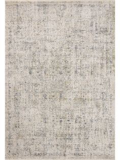 an area rug with grey and white colors