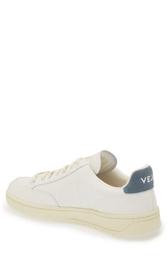 Throwback style takes a clean-cut approach with this leather sneaker signed off by a signature stitched 'V' logo on the sidewall. Lace-up style Removable insole Leather upper/recycled-polyester textile lining/rubber, synthetic and recycled-rubber sole Made in Brazil This brand has B Corp certification, representing business practices with emphasis on social and environmental performance, accountability and transparency This brand meets Nordstrom Responsible Brands criteria: brand adheres to resp White Sneakers With Contrast Stitching For Sports, Leather Sneakers With Contrast Stitching And Round Toe, Leather High-top Sneakers With Contrast Stitching, White Low-top Sneakers With Contrast Stitching, Low-top Sneakers With Contrast Stitching For Streetwear, Low-top Leather Sneakers With Contrast Stitching, Leather Low-top Sneakers With Contrast Stitching, White Casual Sneakers With Contrast Stitching, Casual White Sneakers With Contrast Stitching