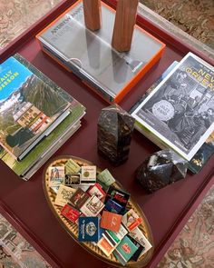 there are many books on the coffee table