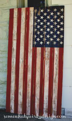 an american flag painted on the side of a building