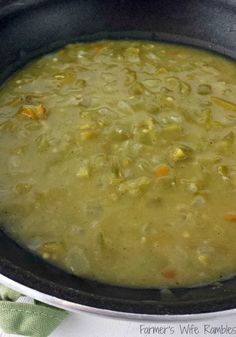 a pot filled with soup sitting on top of a table