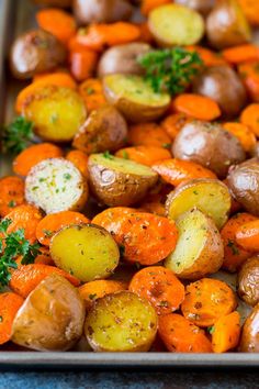 roasted potatoes and carrots with parsley on top