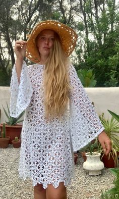 Very cool vintage white crochet oversized bell sleeve dress up-cycled by Vagabond Ibiza We hand source antique and vintage crochet & lace textiles and up-cycle it here in Ibiza in to unique on off a kind garment just for you. Due to the nature there could be some imperfections but we do our best to only recycle mint condition textiles. Hand made in Ibiza with Love Size is Small Condition is perfect Oversized Crochet Top For Beach In Spring, Handmade Lace Crochet Dress For Spring, Bohemian Long Sleeve Crochet Dress For Summer, Bohemian Long Sleeve Crochet Dress For Vacation, Handmade White Dresses For Vacation, Handmade White Crochet Dress For Vacation, White Handmade Crochet Dress For Vacation, Crochet Long Sleeve Dress For Vacation, Handmade White Beach Dress