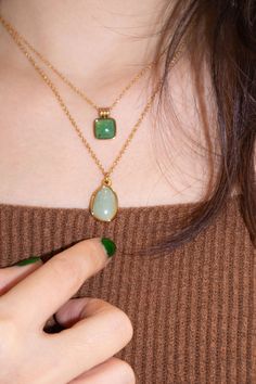 This dainty gemstone necklace with a pop of light green color features a skinny adjustable chain plated with gold and an adventurine pendant. It will be your new everyday necklace no matter the outfit. Weight: 3g Adjustable chain: gold-plated brass, length 400-450mm Pendant: width 10mm x length 12mm Jade Necklace Pendant, Dainty Gemstone Necklace, Dad Jewelry, Light Green Color, June Birthstone Jewelry, Jade Necklace, Everyday Necklace, Stone Pendant Necklace, Pearl Jewellery Earrings