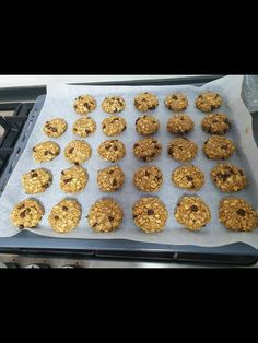 cookies are lined up on a baking sheet and ready to go into the oven for baking