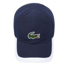 A contrasting edge around the visor brings a crisp twist to the look of this ultra-lightweight Lacoste Sport cap. To boost your style and performance, the sports piece is crafted in microfiber and topped with breathable eyelets. Get your game on with the embroidered green crocodile in front and the adjustable strap in back. Microfiber Adjustable strap Breathable eyelets Visor with contrast edging Green crocodile transfer Shell: Polyester (100%) / Lining: Polyester (100%) / Under visor: Polyester Green Crocodile, Lacoste Sport, Sports Caps, Game On, Trend Setter, Adjustable Straps, Twist, Navy, Sports