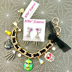 From A 2021 Collection, New Old Stock Release. Set Features A Fun Charm Bracelet That Blends Kitsch With Glam. Spooky Masks, Creepy Hand, Winking Black Cat And Pave’ Crystal Candy Corn Charms. Fabric Mesh Bow. Crystals, Stones, Faux Pearls, Gold And Silver Tone Metals. Ribbon Woven Into The Chain. Adjustable Lengths, Max 8”. Earrings About 2” Drop. Nwt, Htf. Collectible! Metal Halloween Party Jewelry, Nickel-free Jewelry For Halloween Party, Nickel-free Halloween Party Jewelry, Masks Creepy, Creepy Hand, Betsey Johnson Bracelet, Hand Earrings, Crystal Candy, Pearl Charm Bracelet