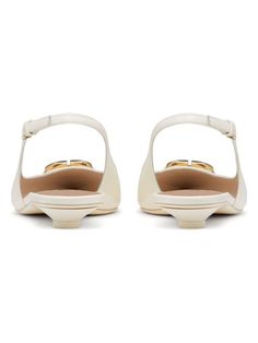 Step up your shoe game with these chic and elegant slingback ballerinas. The iconic VLOGO signature detail in gold-tone metal adds a touch of luxury to the ivory calfskin, while the adjustable strap and oval lacquered heel ensure a comfortable and stylish fit. With a leather sole and rubber insert, these ballerinas are as practical as they are fashionable. Adjustable strap for a customized fit Oval lacquered heel for added elegance Leather sole with rubber insert for comfort and durability Iconi Chic And Elegant, Prada Designer, Leather Buckle, Shoe Game, Designer Sunglasses, Ballerinas, Gold Tone Metal, Watch Design, Low Heels