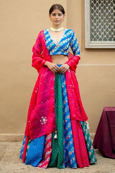 Multicolored lehenga with floral and polka printed panels. Paired with V neck, printed padded raw silk blouse with hand embroidery and hand embroidered satin silk dupatta.
Component: 3
Printed
Neckline: V neck
Sleeve Length: Three quarter
Fabric: Raw Silk, Bangalore Silk, Cotton Silk Satin 
Color: Multi Color
Tassel dupatta
Closure:
Blouse and Lehenga: Side zip - Aza Fashions Multicolored Lehenga, Raw Silk Embroidery, Printed Lehenga, Indian Bridal Outfits, Lehenga Designs, Satin Color, Silk Dupatta, Silk Embroidery, Wedding Fashion