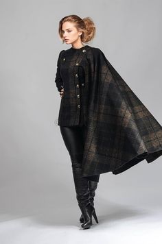 Chic Fitted Cape Outerwear, Fitted Long Sleeve Cape For Winter, Fitted Long Sleeve Winter Cape, Long Sleeve Cape With Buttons For Fall, Elegant Cape-style Outerwear With Buttons, Winter Long Sleeve Cape With Buttons, Winter Long Sleeve Button Cape, Elegant Fall Cape Outerwear, Chic Long Sleeve Cape For Fall