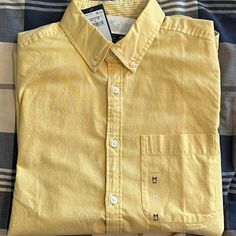 Tommy Hilfiger Slim Fit Casual Button Down Size Medium Color Yellow Tommy Hilfiger Short Sleeve Shirt For Spring, Tommy Hilfiger Spring Short Sleeve Shirt, Classic Shirt With Snap Buttons For Spring, Tommy Hilfiger Cotton Button-up Shirt, Yellow Cotton Button-up Shirt, Yellow Cotton Shirt With Buttons, Tommy Hilfiger Summer Button-up Shirt, Tommy Hilfiger Yellow Cotton Tops, Tommy Hilfiger Spring Workwear Shirt