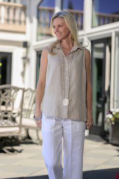 Our collared, button-down sleeveless top is great for layering! Wear it under our linen tunics, blazers and kimonos, or beautiful when worn on its own. Slightly curved shirttail side vents, with back pleat and loop detail. Washed for a soft feel, making it perfect for the office, warm weather getaways, or every day. Stay cool and stylish all day long in this must-have wardrobe staple. 100% linen Machine wash and hang to dry. Iron, if desired. Runs generous. Made in Ukraine Elegant Linen Tops For Layering, Chic Linen Blouse For Layering, Elegant Flax-colored Tops For Spring, Elegant Flax Colored Tops For Spring, Linen Tunic, Essential Bag, Linen Clothes, Nightwear, Warm Weather