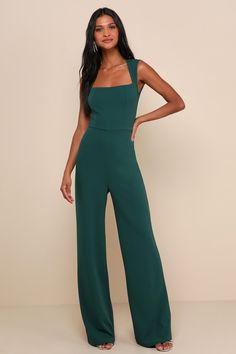 With a chic blazer, leather jacket, or coat, there's no end to how you could style the Lulus Enticing Endeavors Emerald Green Jumpsuit! This sleeveless jumpsuit is made from lightly textured crepe knit with a squared-off neckline, and seamed bodice. High-waisted pant legs fall to a classic wide cut. Hidden back zipper. Fit: This garment fits true to size. Length: Floor length. Size medium measures 61.75" from shoulder to hem. Inseam: 33.50 Front Rise: 14.25 Bust: Great for any cup size. Waist: F Graduation Jumpsuit, What Is Cocktail Attire, Emerald Green Jumpsuit, Lulus Jumpsuit, Jumpsuit Fall, Chic Blazer, Jumpsuit Chic