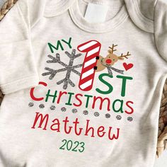 Personalized Baby Romper: Celebrate Your Baby's First Christmas in Style Your baby's My First Christmas Outfit should be memorable, and our Baby Romper is here to make it unforgettable. Personalized and designed for comfort, it's the must-have attire for your baby's first Christmas. Why choose our Personalized Baby Romper for your baby's first Christmas? Personalized Perfection: Customize it with your baby's name, marking this momentous occasion. Comfortable & Stylish: Crafted from gentle materi Clothes Must Haves, Granny Christmas, My First Christmas Outfit, First Christmas Outfit, Onesies Baby, Cricut Baby, Christmas Romper, Christmas Onesie, Christmas Clothes