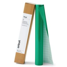 a blue tube next to a cardboard box on a white background with the word vinyl printed on it