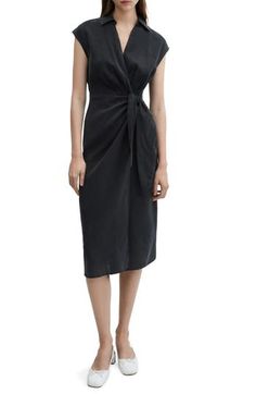 Set out from the office to nights on the town in this versatile wrap dress that's topped with a sleek and sophisticated collar. True wrap style with side tie closure Johnny collar Cap sleeves Unlined 83% modal, 17% polyester Machine wash, line dry Imported Summer Draped Wrap Dress For Date Night, Summer Evening Draped Wrap Dress, Workwear Ruched Midi Dress With Surplice Neckline, Silk Midi Dress With Tie Waist For Work, Summer Silk Wrap Dress With Tie Waist, Ruched Midi Dress With Surplice Neckline For Work, Silk Wrap Dress With Tie Waist For Summer, Chic Formal Draped Wrap Dress, Chic Draped Wrap Dress For Formal Occasions