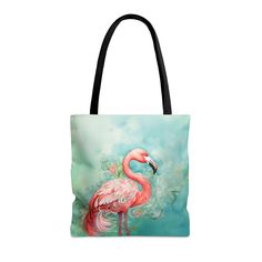 "🦩🌸This tote bag combines practicality with style, showcasing a whimsical flamingo designed with the look of watercolor painting. Whether you're heading on vacation, to the beach, the library, or just exploring town, it's the perfect companion. You can choose from two sizes to suit your needs. 🦩🌸Medium: Dimensions of 16\" x 15\" x 3.46\" 🦩🌸Large: Dimensions of 18\" x 17\" x 3.46\" 🌸 Features: Crafted from 100% Polyester Reinforced with sturdy boxed corners for extra durability Features sl Pink Shoulder Bag For Everyday Use, Pink Shoulder Bag For Everyday Use On Mother's Day, Large Reusable Travel Bag, Reusable Tote Bag For On-the-go, On-the-go Reusable Tote Shoulder Bag, Reusable Tote Shoulder Bag For On-the-go, Reusable Tote Shoulder Bag For Gifts, Pink Tote Bag For Mother's Day, Mother's Day Travel Tote Canvas Bag