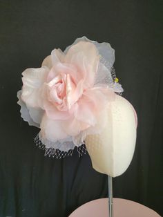 "Pretty light Pink Rose fascinator, made of a Large Silk and organdy rose with French veil with green dots and Green leaves on a pink velvet headband. Rose measures about 11-12\" across, beautiful shade. Perfect for the Kentucky derby, weddings, derby and tea parties etc. Other colors available" Elegant Rose Fascinator With Handmade Flowers, Rose Fascinator For Kentucky Derby Wedding, Tulle Fascinator For Royal Ascot, Rose Fascinator For Wedding And Kentucky Derby, Elegant Rose Wedding Fascinator, Feminine Fascinator For Royal Ascot Wedding, Feminine Fascinator For Wedding And Royal Ascot, Feminine Fascinator For Wedding At Royal Ascot, Rose Wedding Fascinator With Handmade Flowers