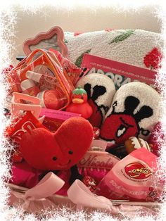 a basket filled with valentine's day treats and other things to put in it