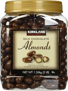 milk chocolate almonds in a jar