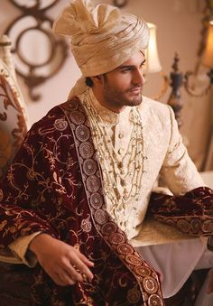 Buy Pakistani Men Skin Sherwani with Shawl in Red in Fine Quality with Embellishments paired with Straight-cut Trousers/Churidar. Customizable. Fast Shipping