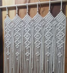 macrame wall hangings made with white yarn