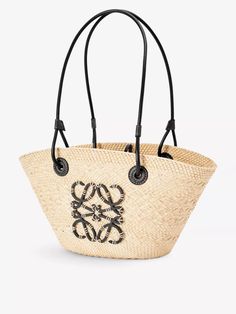 This traditional basket bag from Loewe Paula's Ibiza evokes such strong connotations of summer – from the ocean breeze to the sun-scorched sand. But did you know the process behind this Anagram-stamped style? In Colombia, Iraca palm trees are cultivated, harvested and sun-dried before being handwoven by artisans from Corporación Oficio y Arte (an organisation guided by fair trade principles) into the shapely vessel for beach essentials you’ll sling on your shoulder. (Height 17cm, width 38cm, depth 13cm) Loewe Paula's Ibiza, Leather Basket, Traditional Baskets, Loewe Bag, Chinese English, Beach Essentials, Ocean Breeze, Basket Bag, Sun Dried