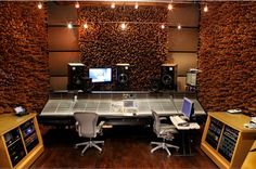 a recording studio with sound equipment and lights