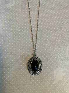 "Southwest inspired pretty antique oval shaped silver tone necklace features ornate edging with center synthetic black stone necklace. Pendant measures 1 1/8\" L X 1\" W and is on an 18\" chain. Also available in red under the following listing: https://www.etsy.com/listing/1205499789/red-stone-necklace-red-stone-pendant-red?ref=listings_manager_grid ★ Want to see more? Please visit my shop at: https://www.etsy.com/shop/DesignsByPeg" Goth Closet, Black Stone Jewelry, Black Stone Pendant, Black Stone Necklace, Old Necklace, Red Stone Necklace, Black Pendant Necklace, Black Gems, Edgy Jewelry