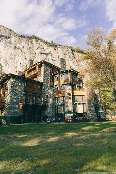 a large stone building with wooden balconies on the front and side of it