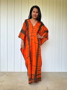 Unwind in absolute comfort with our semi sheer cotton gauze kaftan. This kaftan is perfect for the beach, pool, resort and laid-back time at home. Crafted from quality soft and breathable gauze cotton, it offers an airy fit that's ideal for lounging and cover up. Its relaxed design and easy slip-on style make it your go-to choice for outdoor cover up and relaxed nights at home. Beachy Flowy V-neck Kaftan, Beachy V-neck Cover-up With Relaxed Fit, Flowy Cotton Cover-up For Vacation, Festival Cotton V-neck Cover-up, Bohemian Style Unlined Kaftan For Vacation, Oversized Long Kaftan For Beach, Flowy V-neck Kaftan For Poolside, Cotton Maxi Dress For Beach Cover-up, Cotton Tunic Cover-up For Vacation