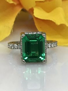 Emerald Cut Emerald And Diamond Engagement Wedding Anniversary Ring In 14K White Gold #5364 by InfinityJewelersUSA on Etsy 14k White Gold Emerald Cut Halo Ring, Emerald Cut Emerald Ring With Halo Setting, Classic Diamond Halo Ring For May Birthstone, Green Emerald-cut Halo Ring For Promise, Emerald Cut Green Diamond Ring With Diamond Accents, Emerald Cut Green Diamond Ring With Accents, Green Emerald Cut Ring With Halo Setting, Green Emerald Cut Halo Ring With Gemstone, Asscher Cut Emerald Ring With Diamond Accents