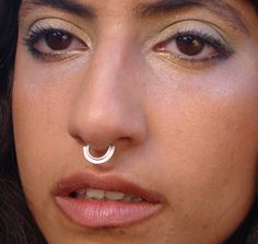 Minerva Goddess of poetry, medicine, wisdom, strategic warfare, commerce, weaving, and the crafts be the goddess that you are! A beautiful delicate septum ring, made from 925 Sterling silver and love Indian Tribal style nose jewelry that's shine on. ~ Can be used as a nose ring /septum / tragus / single earring / helix / lip ring ~ Size of the nose ring: Inner diameter : 1/4, 5/16 or 3/8 inch (6,7,8 or 9 mm) Wire gauge :24, 22,20,18 or 16 (0.5, 0.6, 0.8, 1 or 1.2 mm) ~ For larger sizes and speci Internally Threaded Minimalist Septum Ring, Minerva Goddess, Boho Nose Ring, Nostril Ring, Indian Nose Ring, Helix Earring, Wire Gauge, Silver Nose Ring, Cartilage Hoop