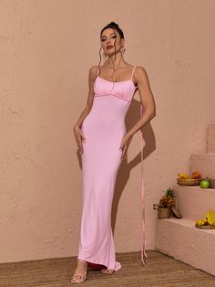 Introducing the Tenley Spaghetti Backless Maxi Dress in Pink. Made with lightweight spaghetti straps and a backless design. this maxi dress will keep you cool and comfortable all summer. The pink hue adds a pop of color to any wardrobe. Perfect for any special occasion. Material: 100% Polyester Stretch Factor: Slight Stretch Clean: Gentle machine wash Color may vary due to the lighting on images. The product images (without model) are the closest to the true color of the product Model is wearing Backless Maxi Dress, Backless Design, Backless Maxi Dresses, Home Dress, Floral Mini Dress, Black Sequins, Keep Your Cool, The Pink, True Colors