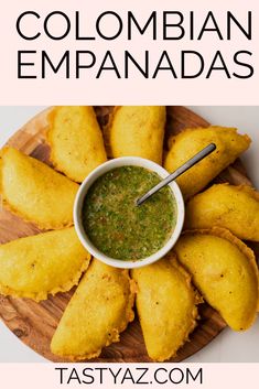 an image of some food on a plate with the words colombian empanadas