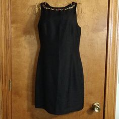 Cleaning Up And Found This Gorgeous Dress Still In The Bag With Tags. I Never Wore It And Can't Now So It's Up For Grabs. Sheath Dress Is Black 100% Silk With Elegant Detail At The Neckline With Rosettes And Gold Stitching. Hidden Zipper In The Back. Note There Is A Small Pull On One Rosette And A Few Small Imperfections In The Silk (See Photos). Lying Flat The Bust Is 16 Inches And The Waist Is 14.5 Inches. It's Fully Lined. Size Is 2p. Lovely Lbd! Silk Sheath Dress, Sophisticated Dress, In The Bag, Gorgeous Dresses, Hidden Zipper, Sheath Dress, Colorful Dresses, Stitching, Im Not Perfect